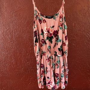 Dusty pink romper with floral print